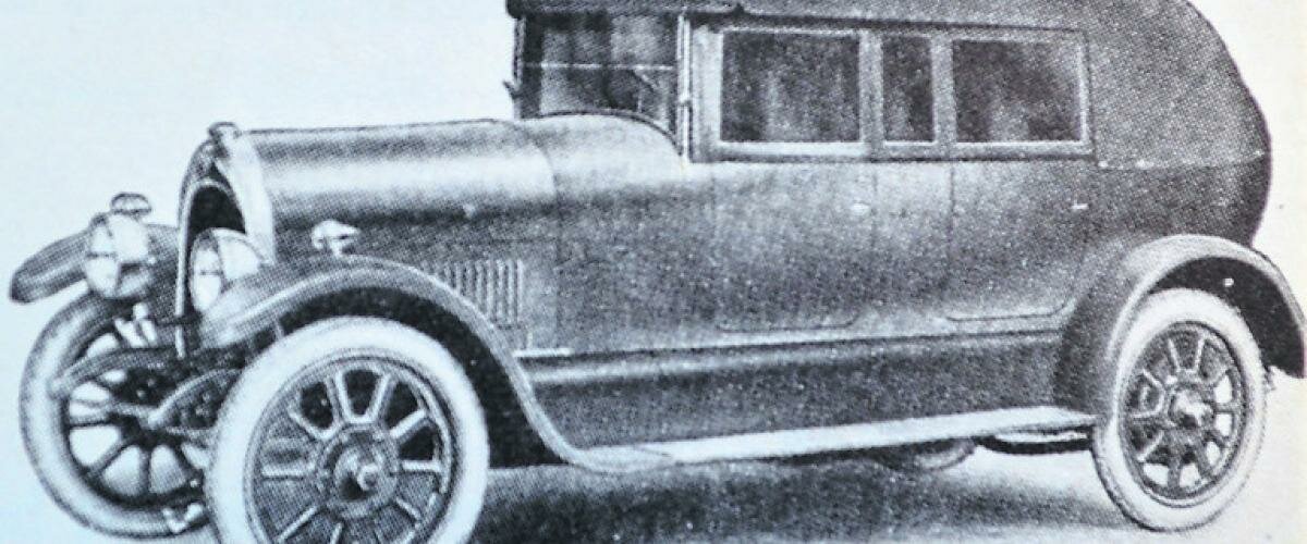 The 1923 Ruston-Hornby A3 model all weather tourer fitted with rigid side curtains.